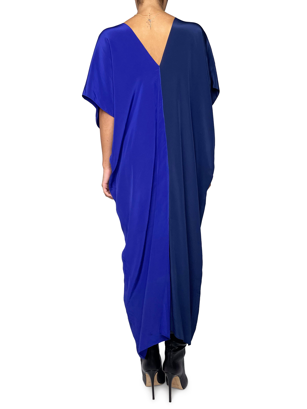Flowy blue dress divided in the middle with a blue ribbon