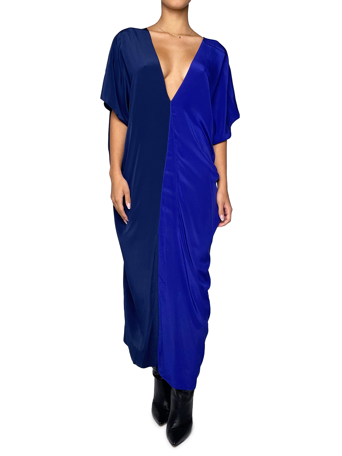 Flowy blue dress divided in the middle with a blue ribbon