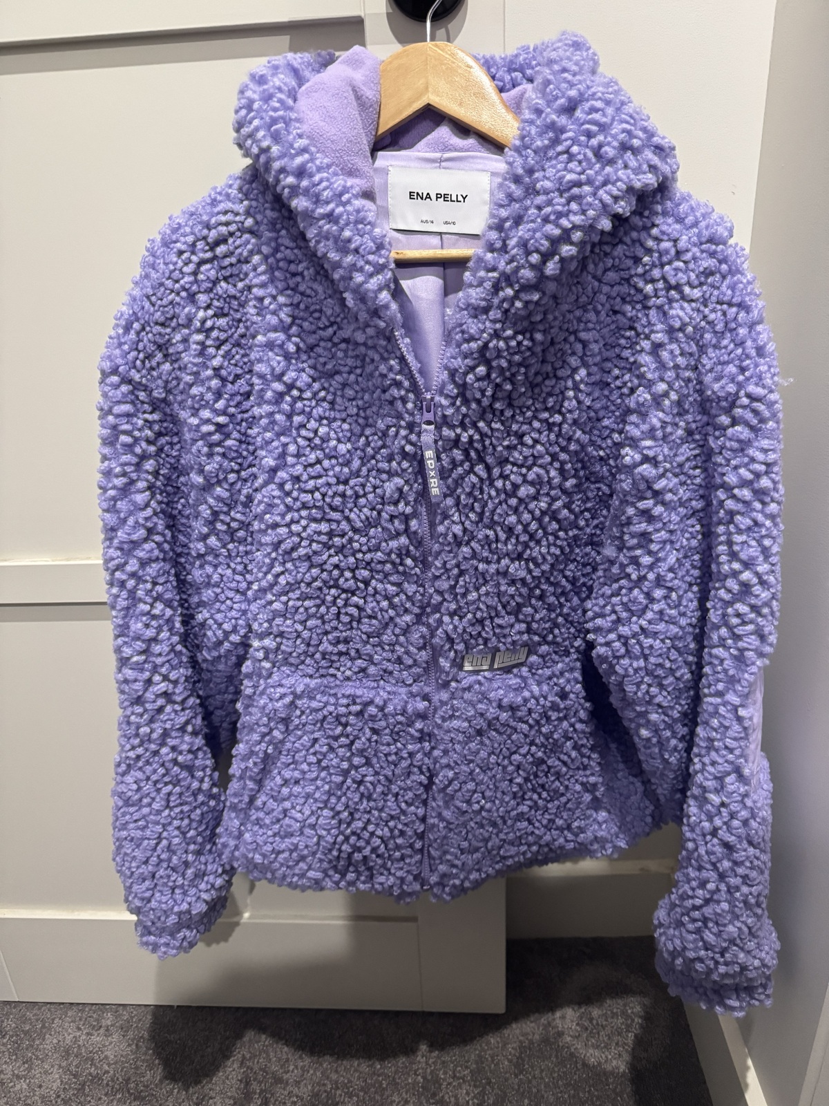 Renee Enright purple jacket 