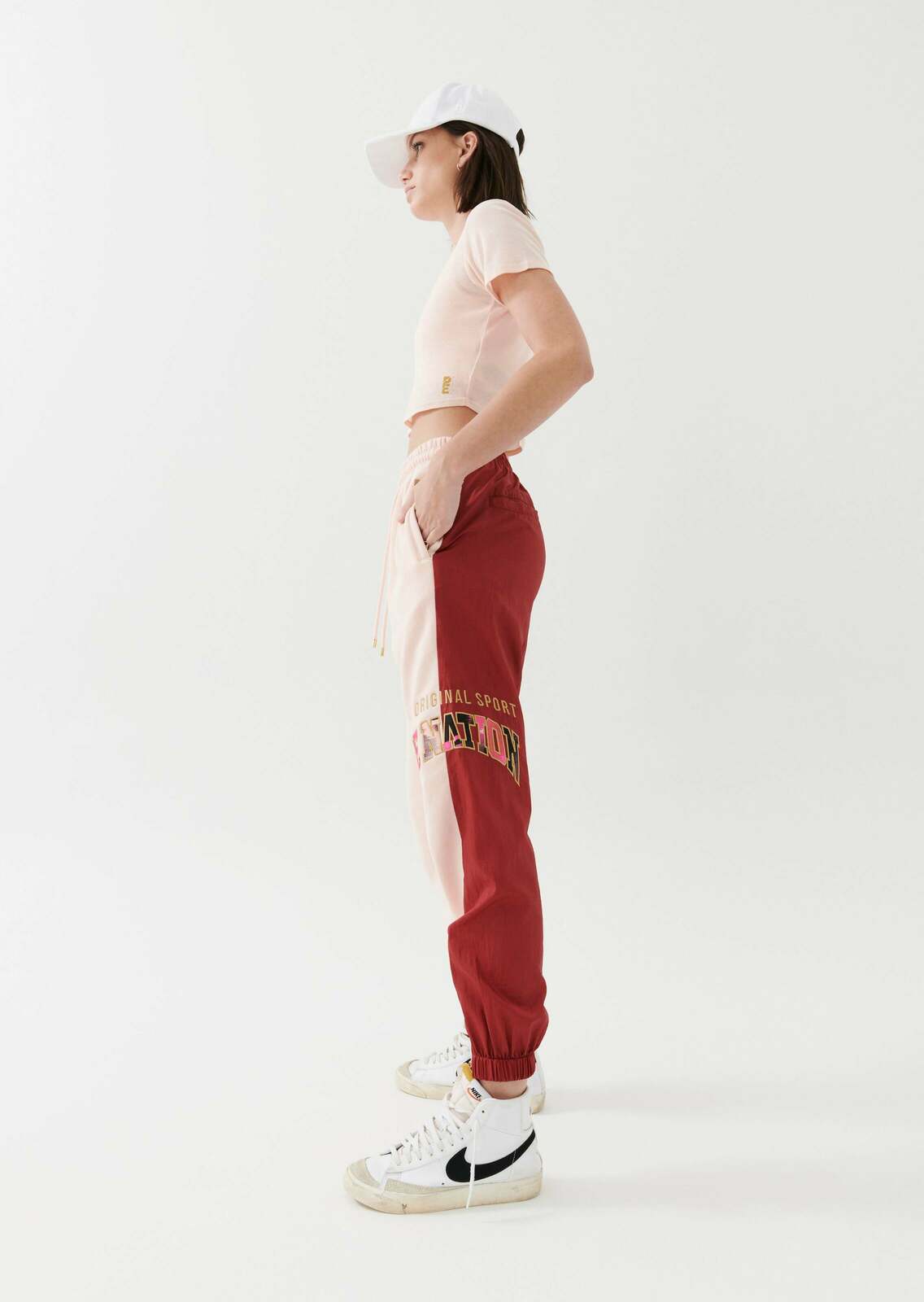 DOUBLE UNDER TRACKPANT IN CANDY