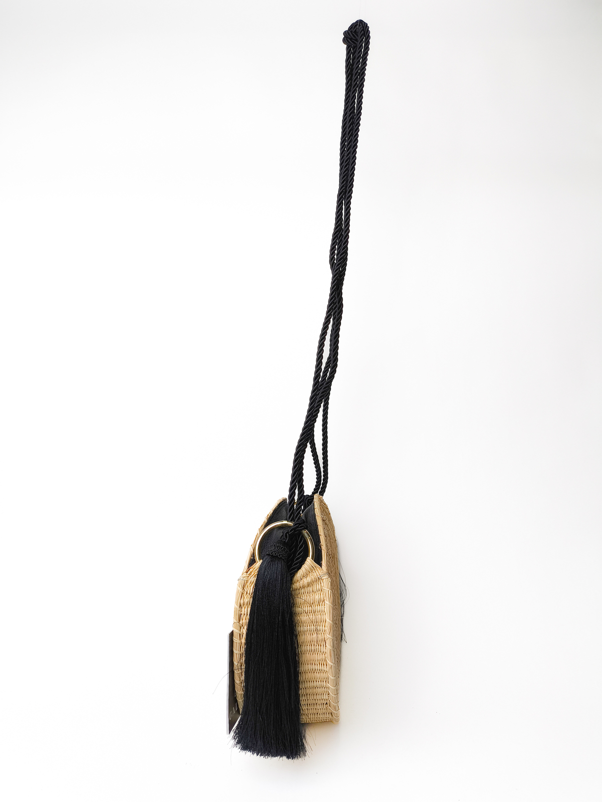 Circlular weaved bag with black string