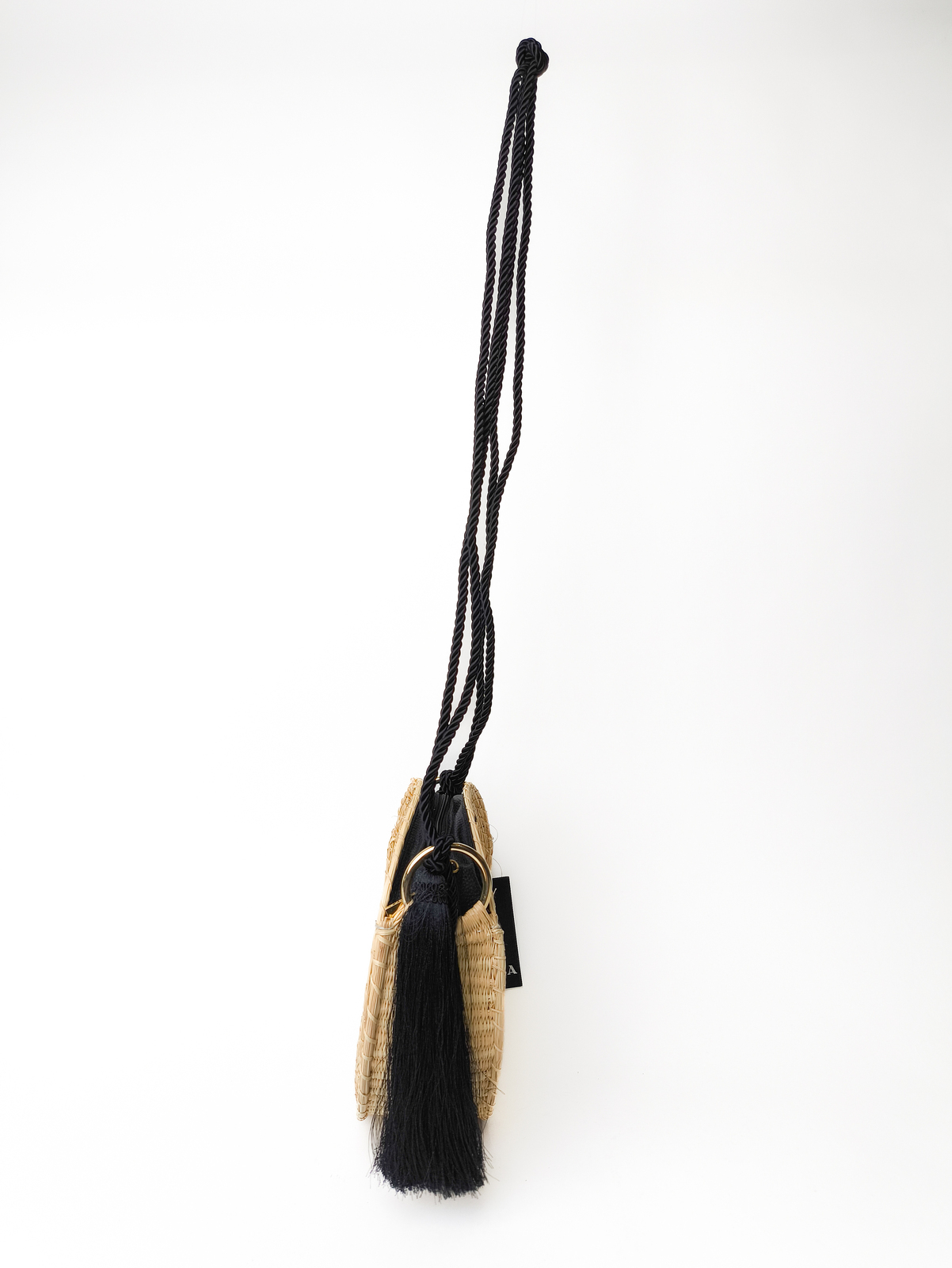 Circlular weaved bag with black string