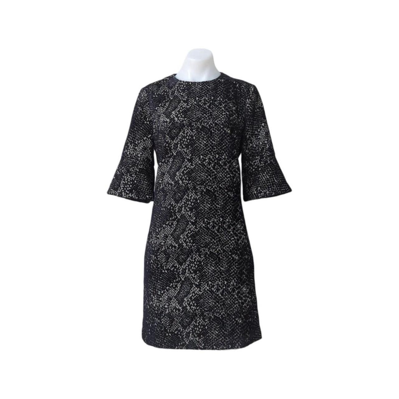 Size 10 black chenille jacquard  with half bell sleeves.