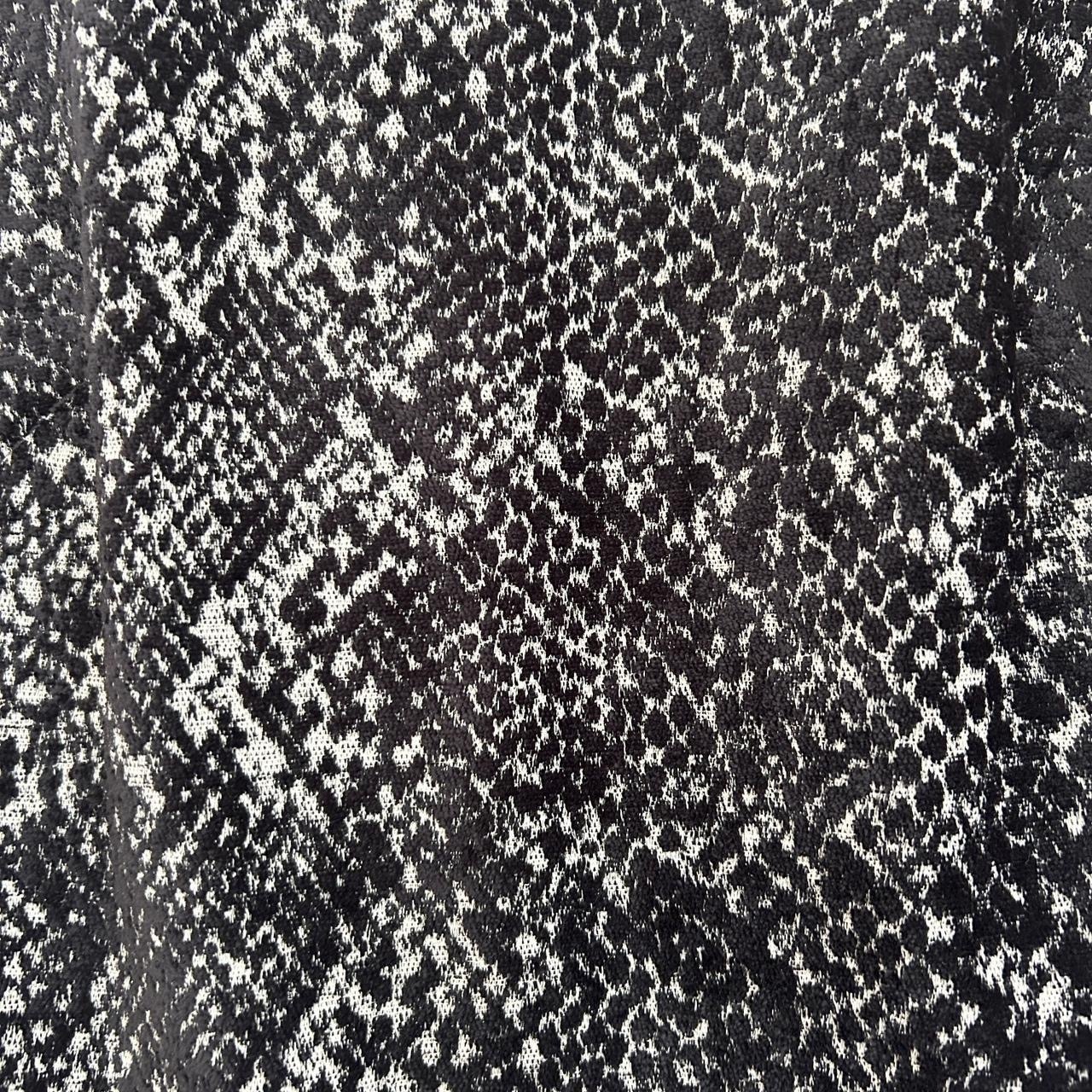 Size 10 black chenille jacquard  with half bell sleeves.