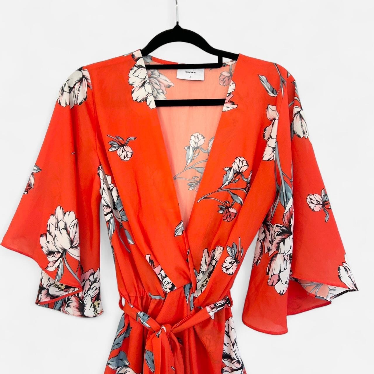 Size 6 Red Orange floral print with wrap neckline and tie waist