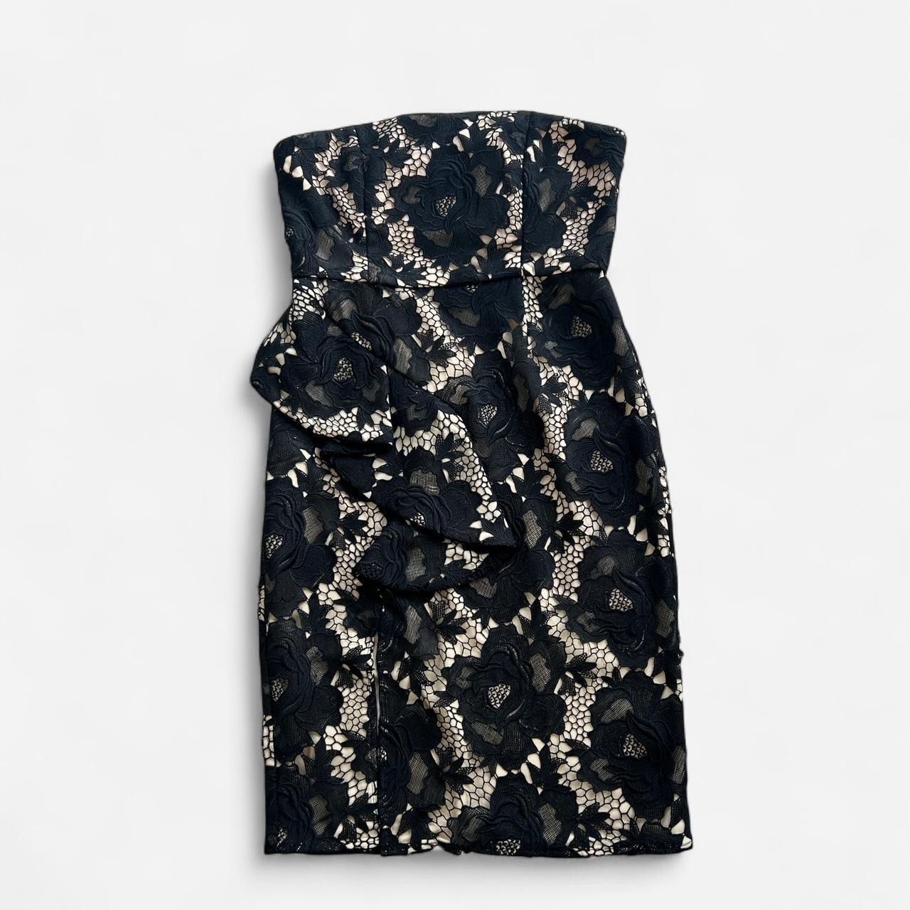 Size 10 black floral lace strapless with front slit and peplum.