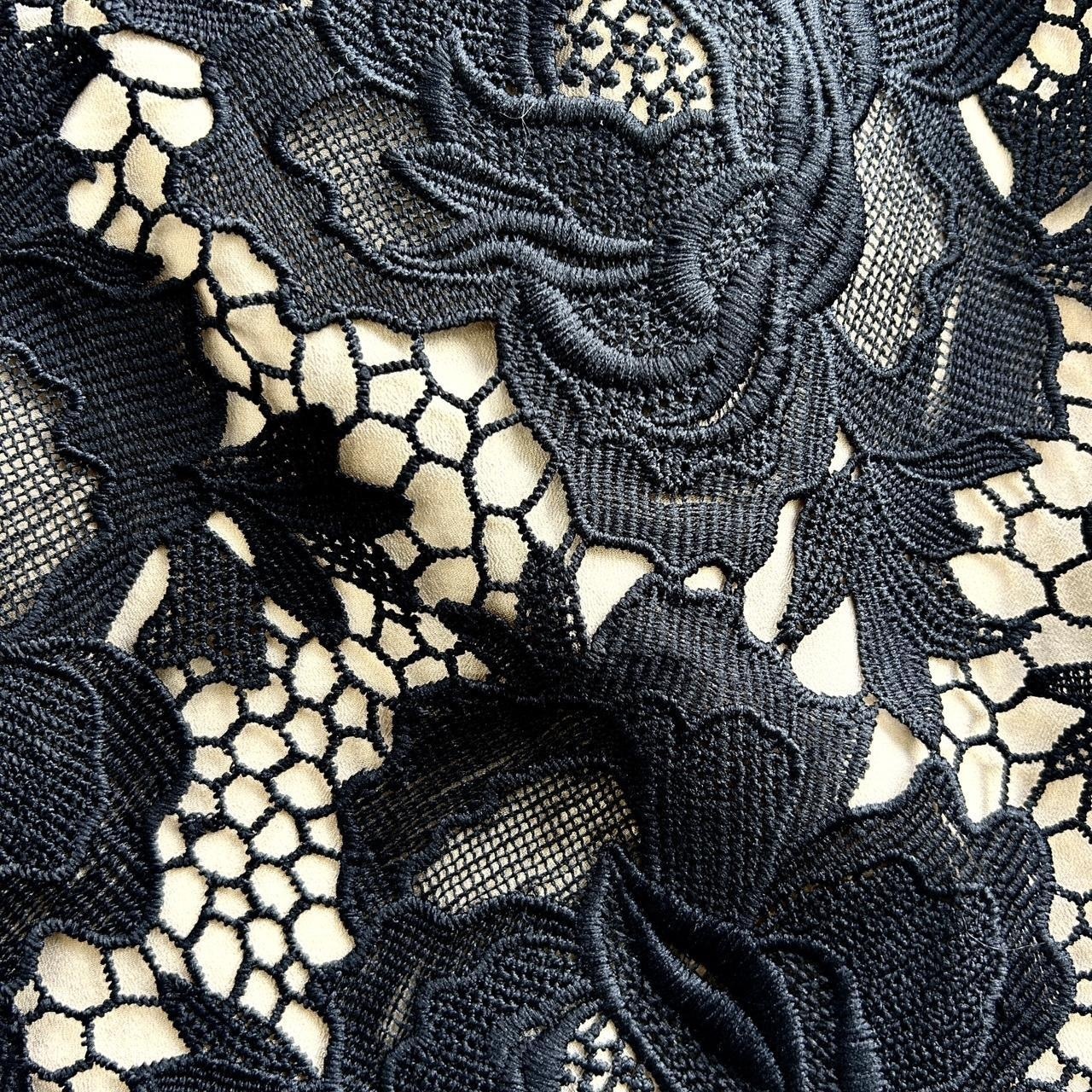 Size 10 black floral lace strapless with front slit and peplum.