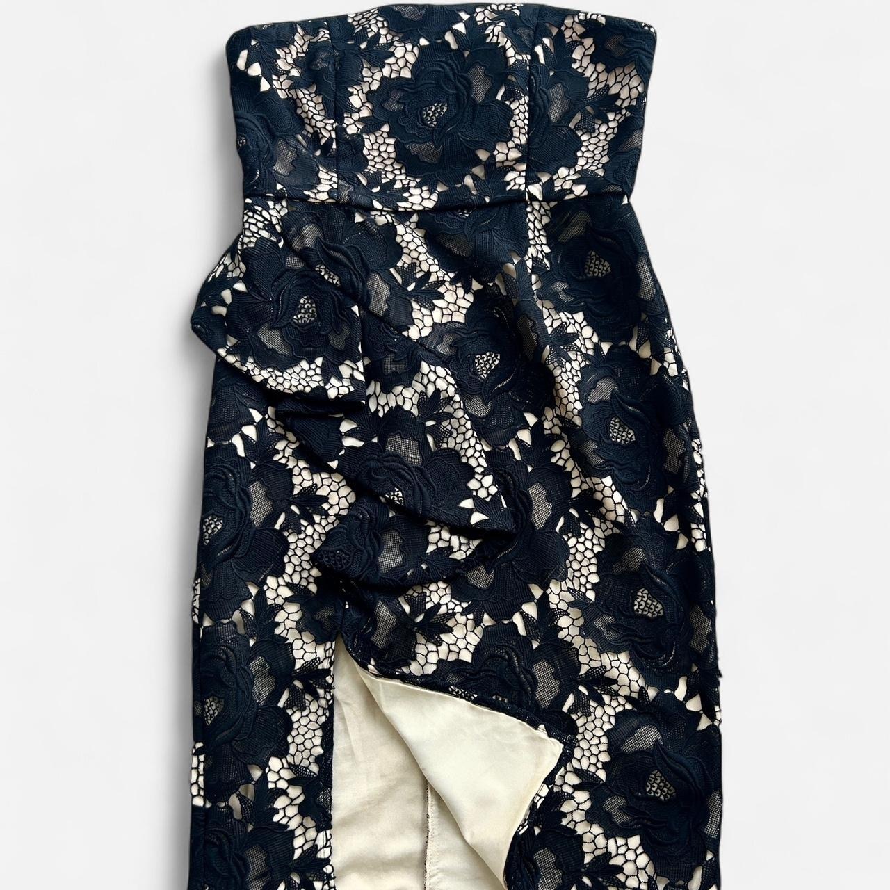 Size 10 black floral lace strapless with front slit and peplum.