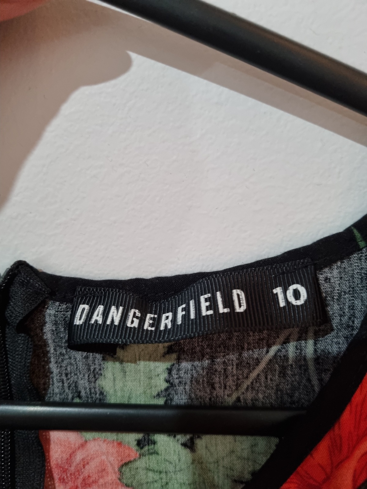 Black dress with red floral print