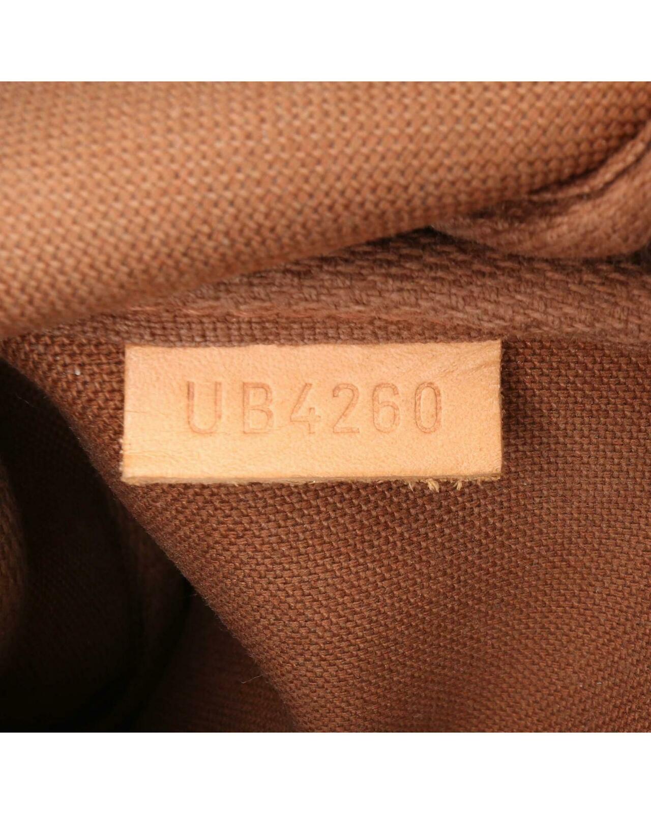 Pochette Accessoires Monogram Zip - Brown / One Size