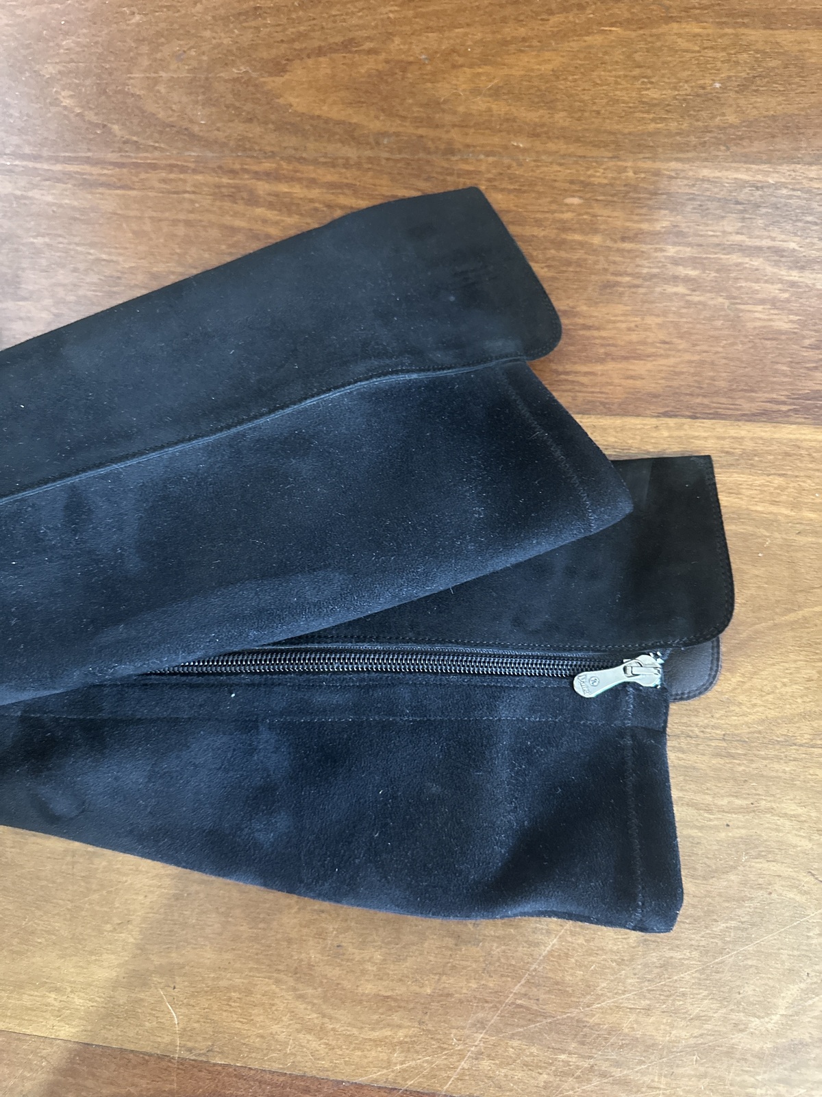 Black suede long boots with tassel detail 