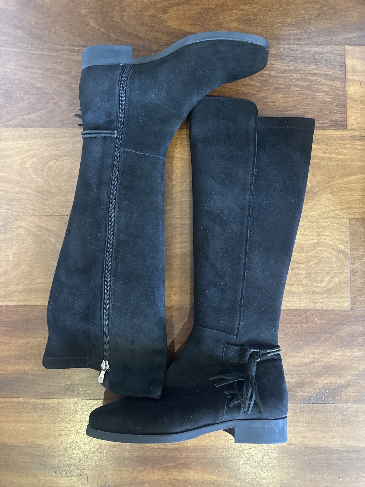Black suede long boots with tassel detail 