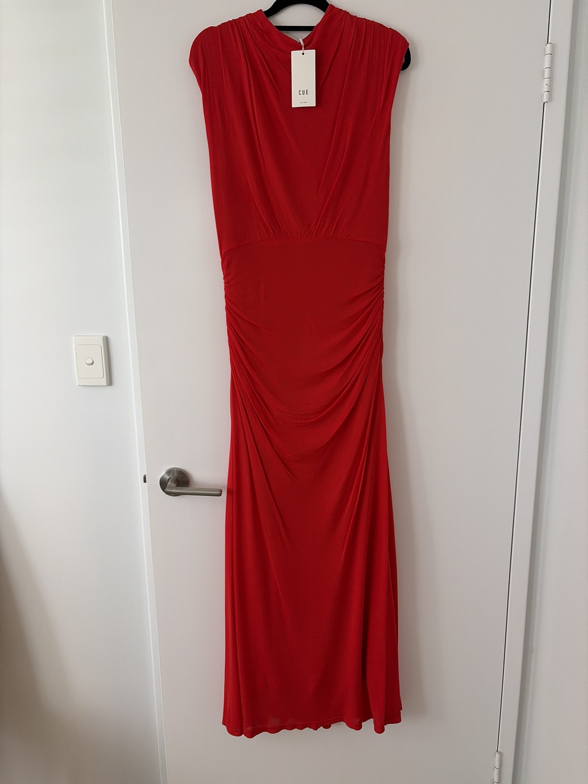 Cue long red dress