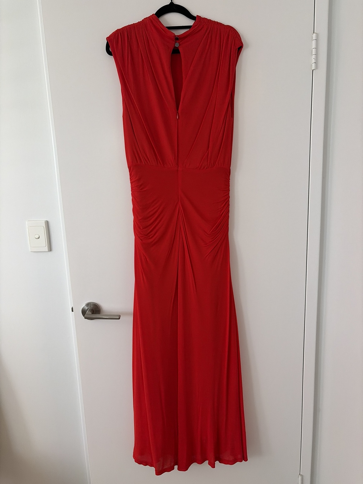 Cue long red dress