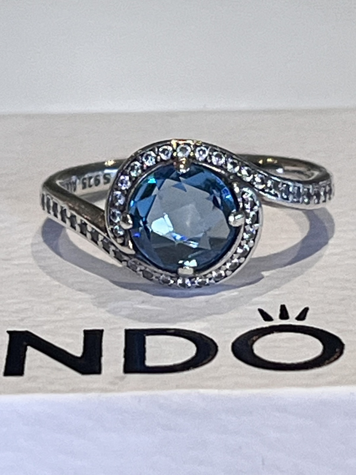 EMBELLISHMENT RING STERLING SILVER SKY BLUE CRYSTAL & CZ -52