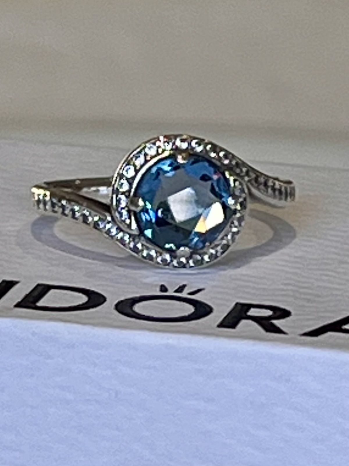 EMBELLISHMENT RING STERLING SILVER SKY BLUE CRYSTAL & CZ -52