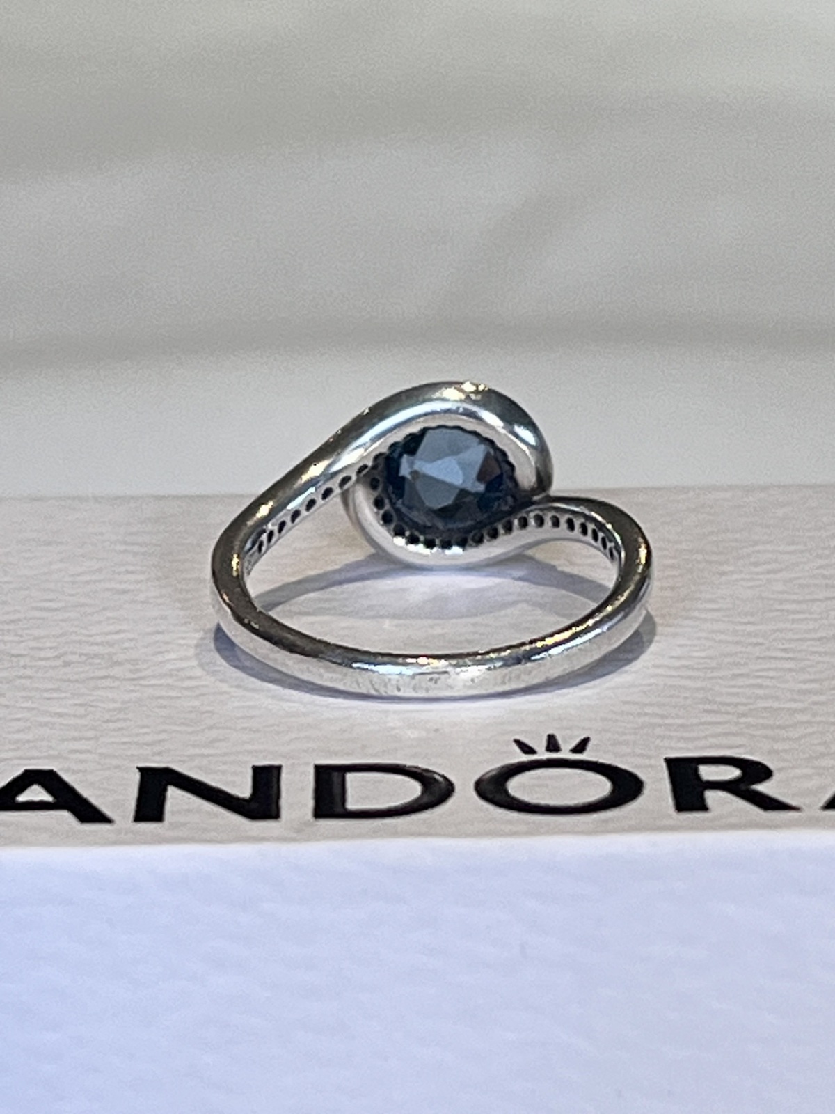 EMBELLISHMENT RING STERLING SILVER SKY BLUE CRYSTAL & CZ -52