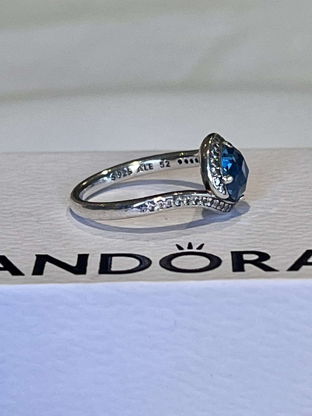 EMBELLISHMENT RING STERLING SILVER SKY BLUE CRYSTAL & CZ -52