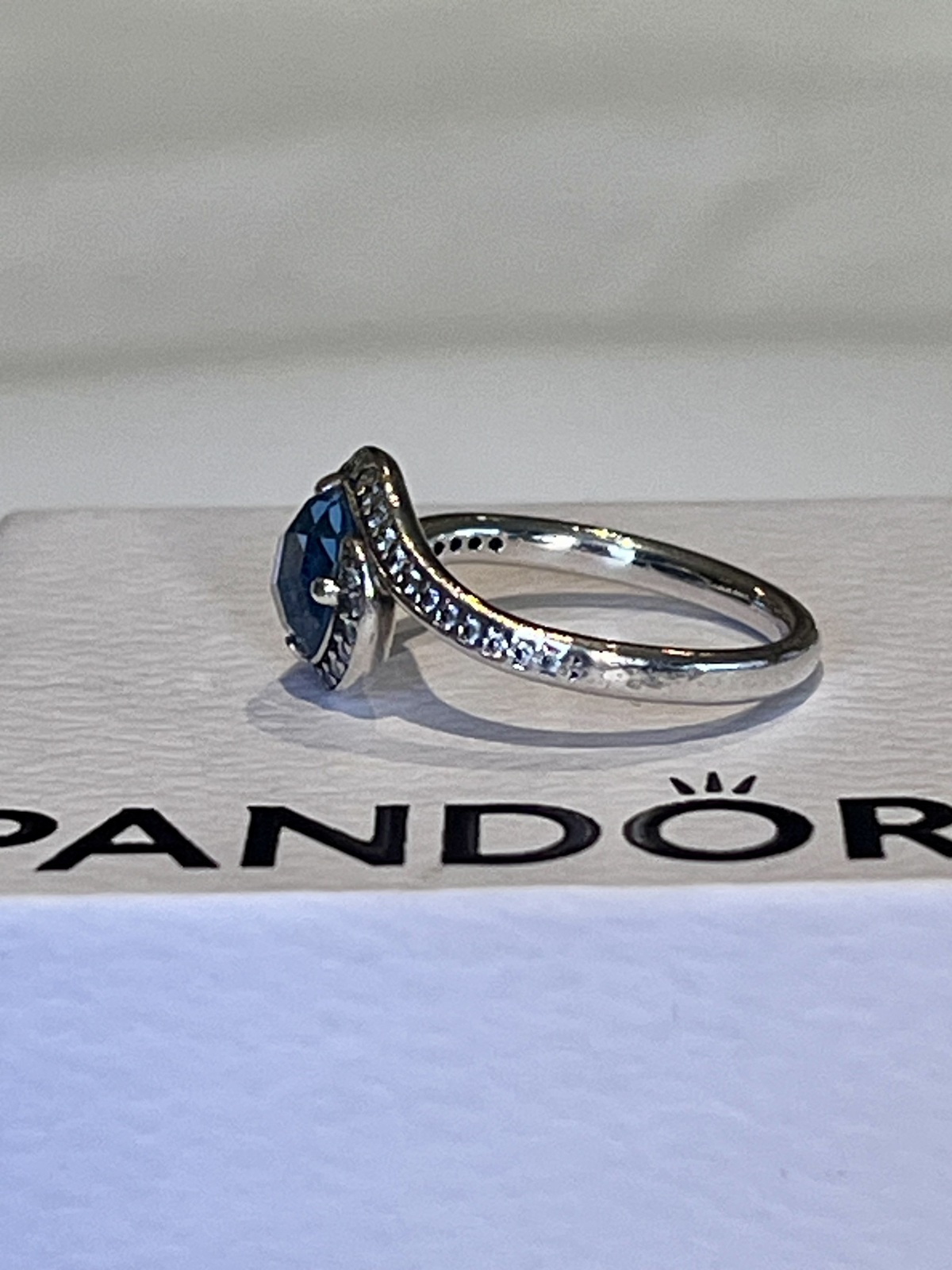 EMBELLISHMENT RING STERLING SILVER SKY BLUE CRYSTAL & CZ -52