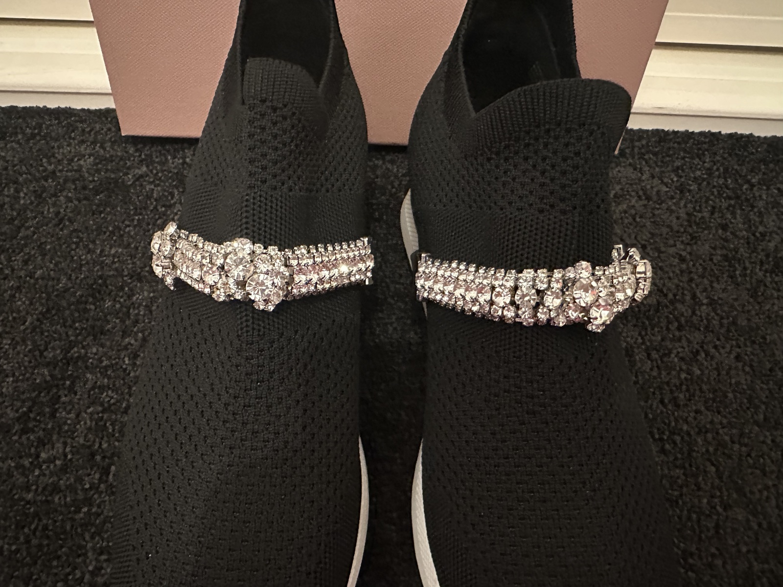 black stretch embellished slip on sneaker