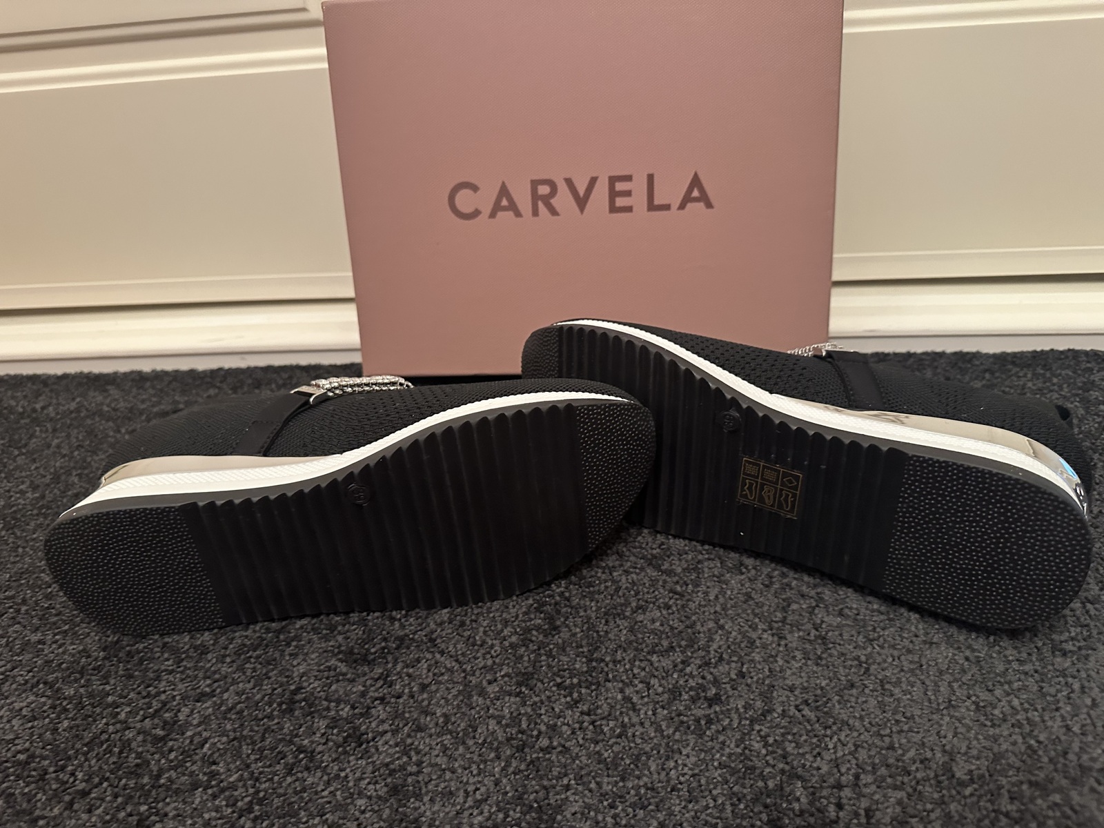 black stretch embellished slip on sneaker