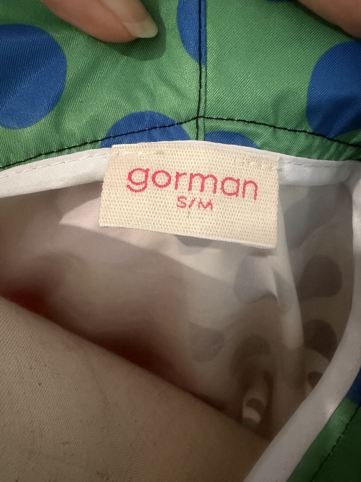 multi coloured raincoat. 