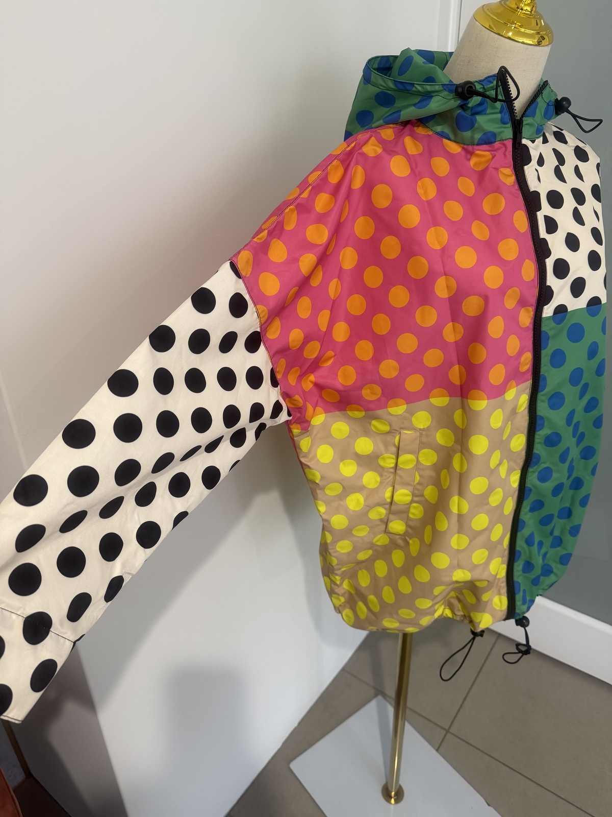 multi coloured raincoat. 