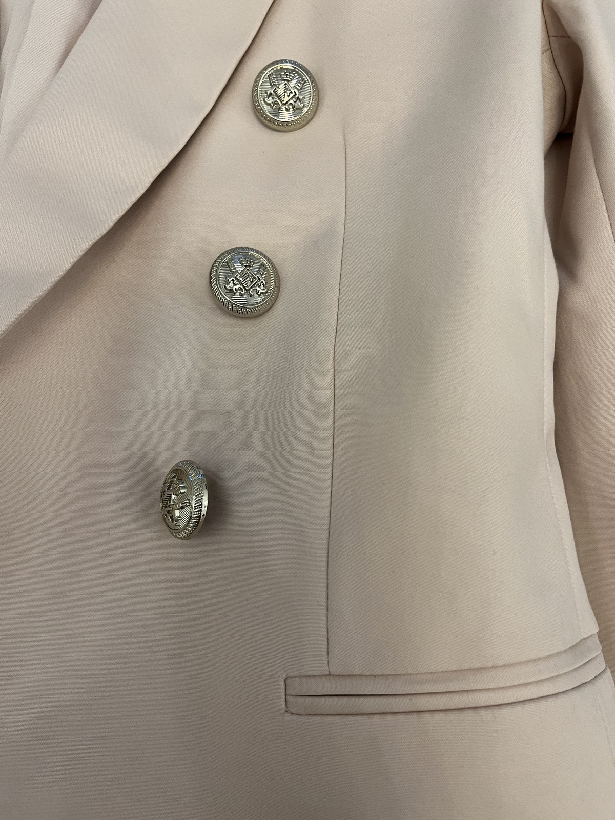 pale pink tailored double-breasted blazer with gold buttons 
