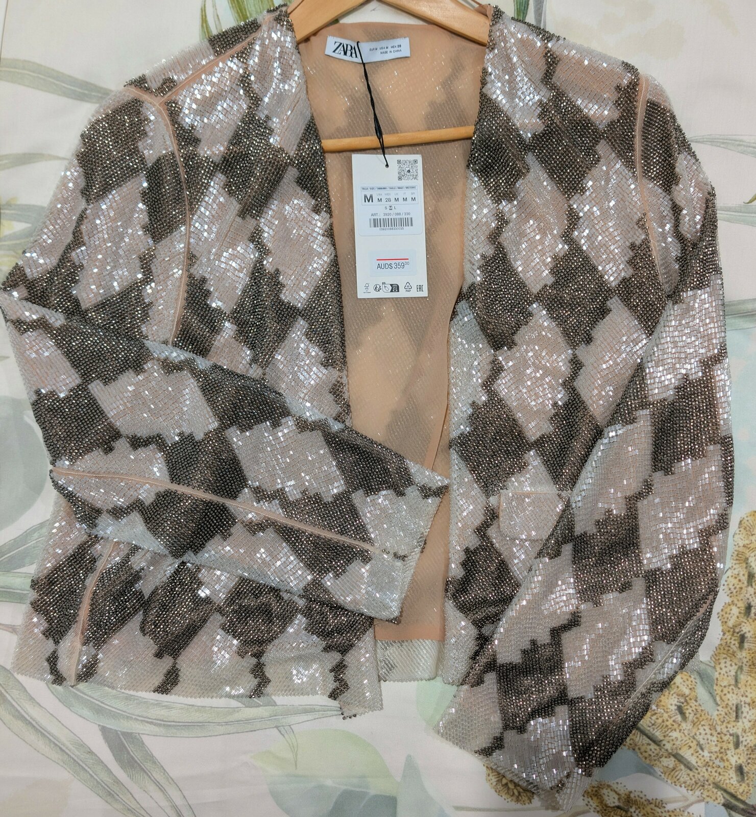 - Harlequin Beaded Jacket