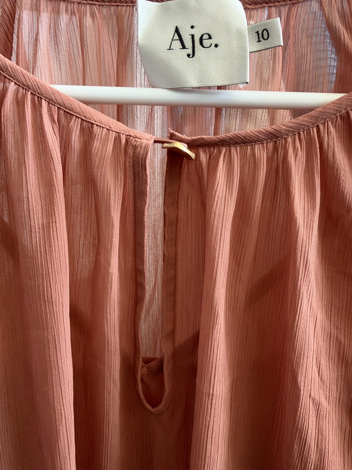 pink ruffle top