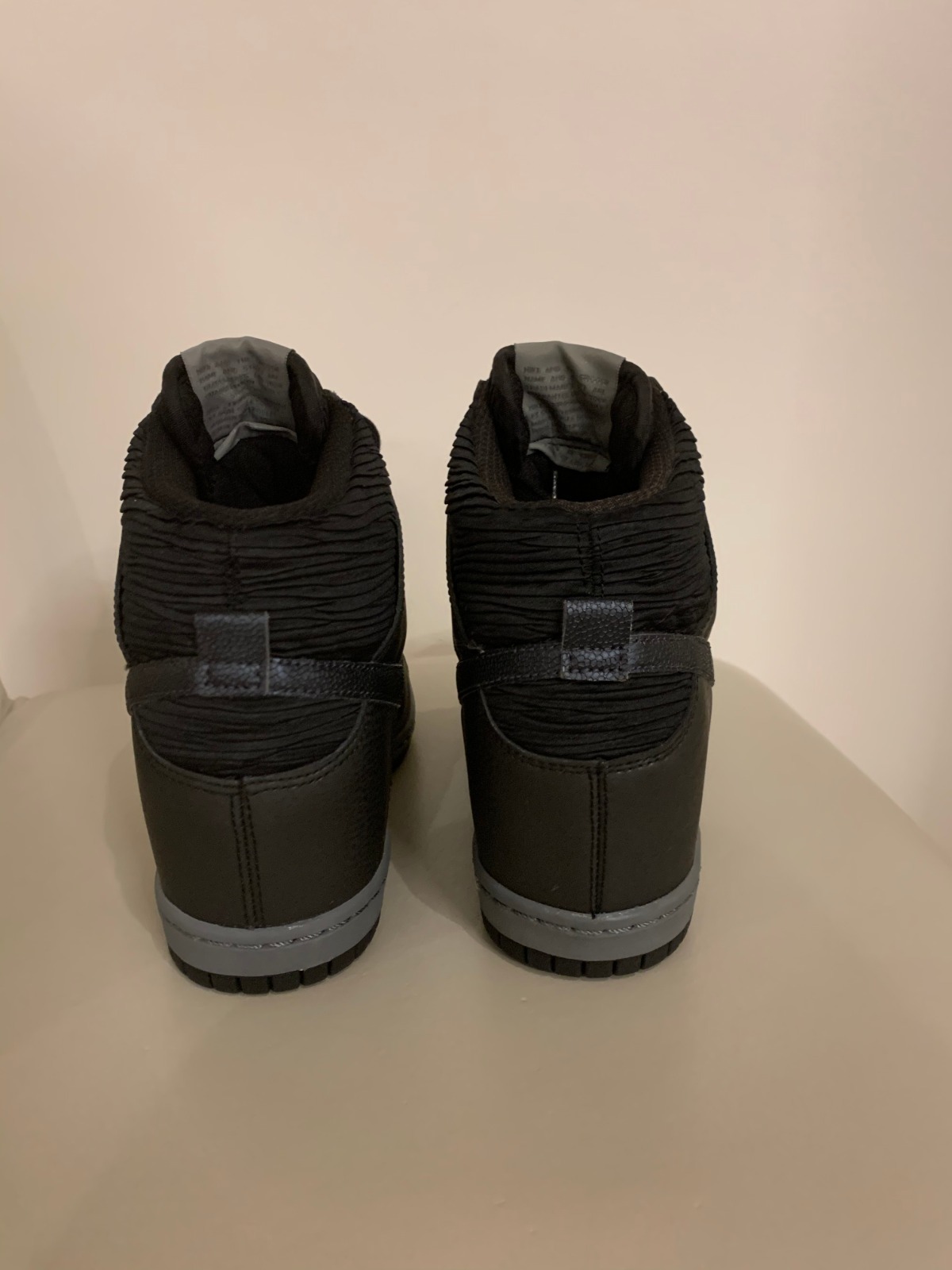 nike black wedge trainers