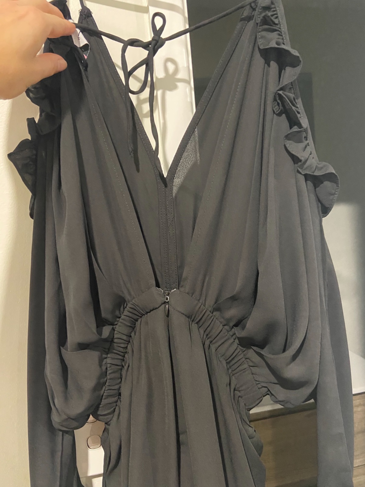 Black long sleeve play suit BNWT Size 10