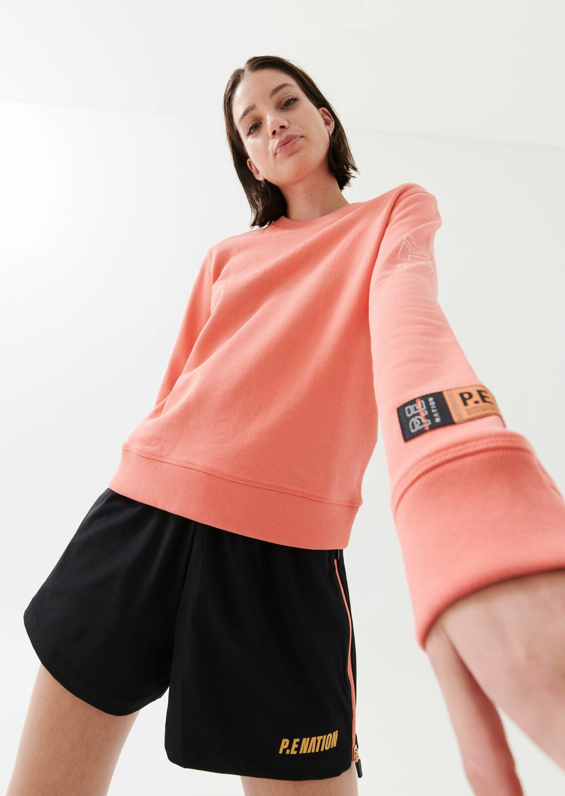 OUTRUN SWEAT IN PERSIMMON