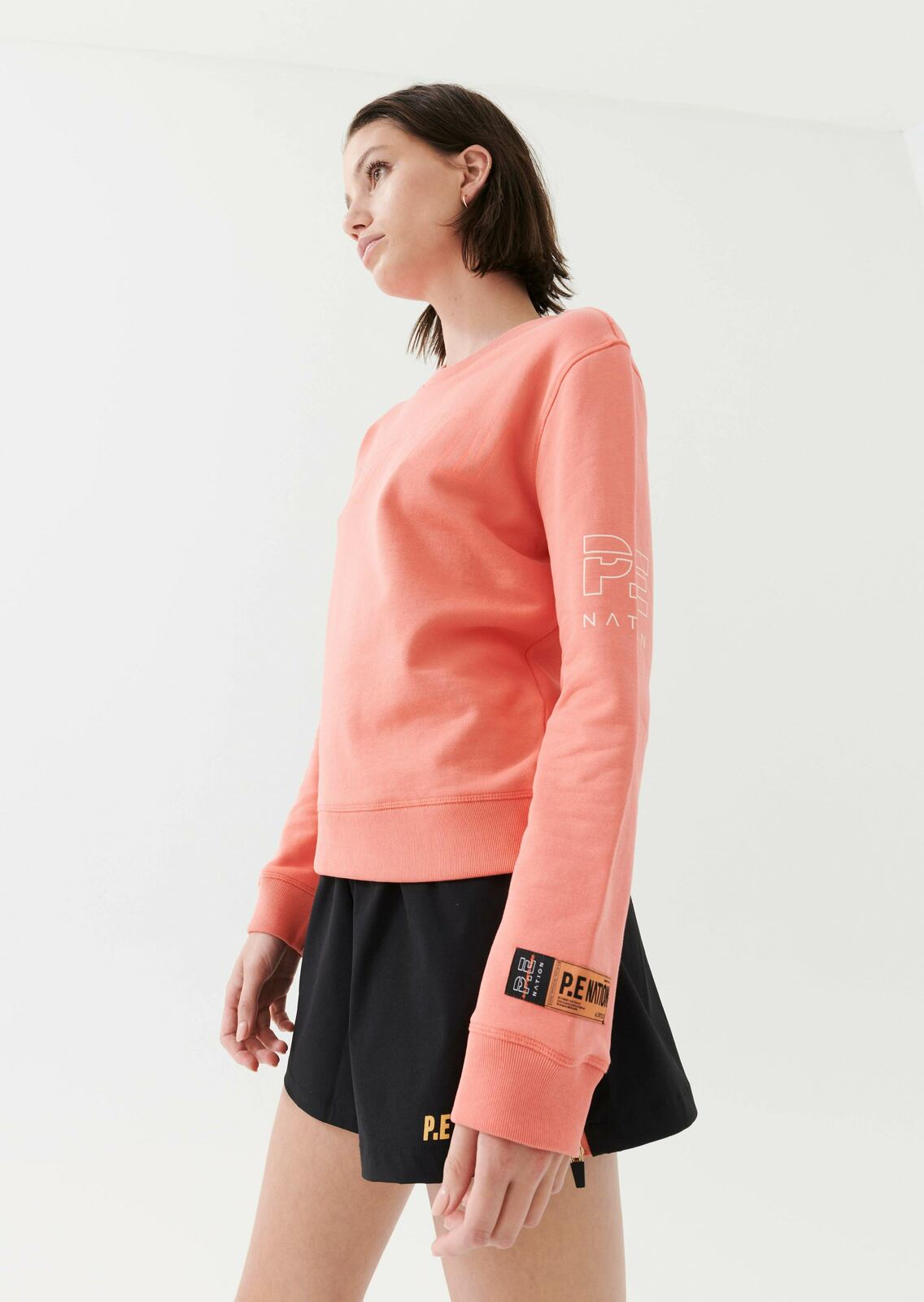 OUTRUN SWEAT IN PERSIMMON