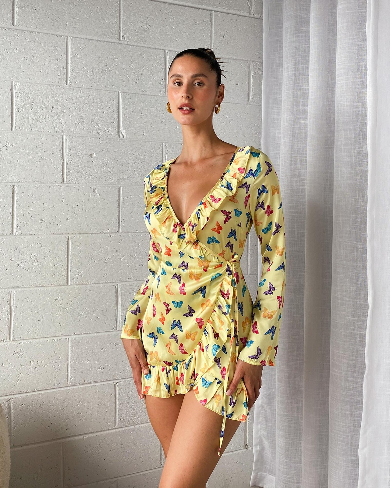 Metamorphosis Wrap Mini Dress
