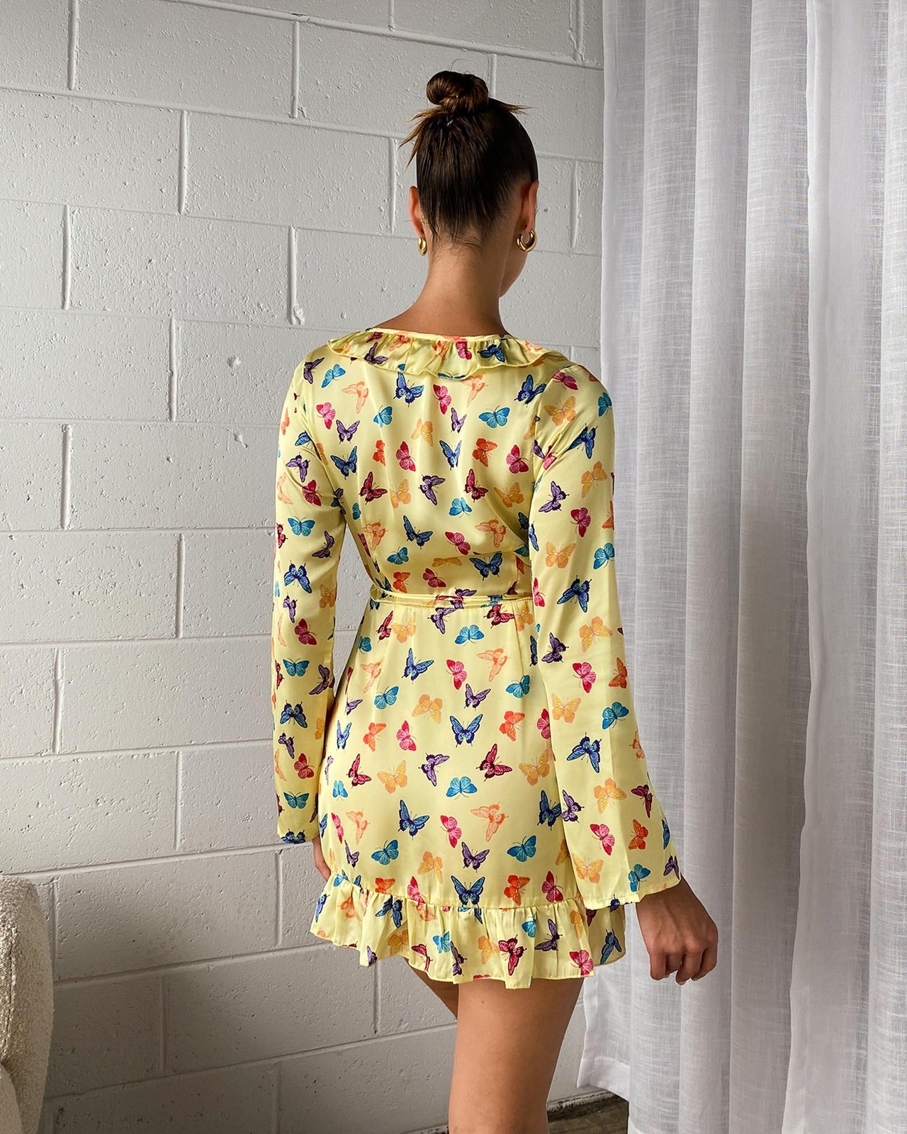 Metamorphosis Wrap Mini Dress