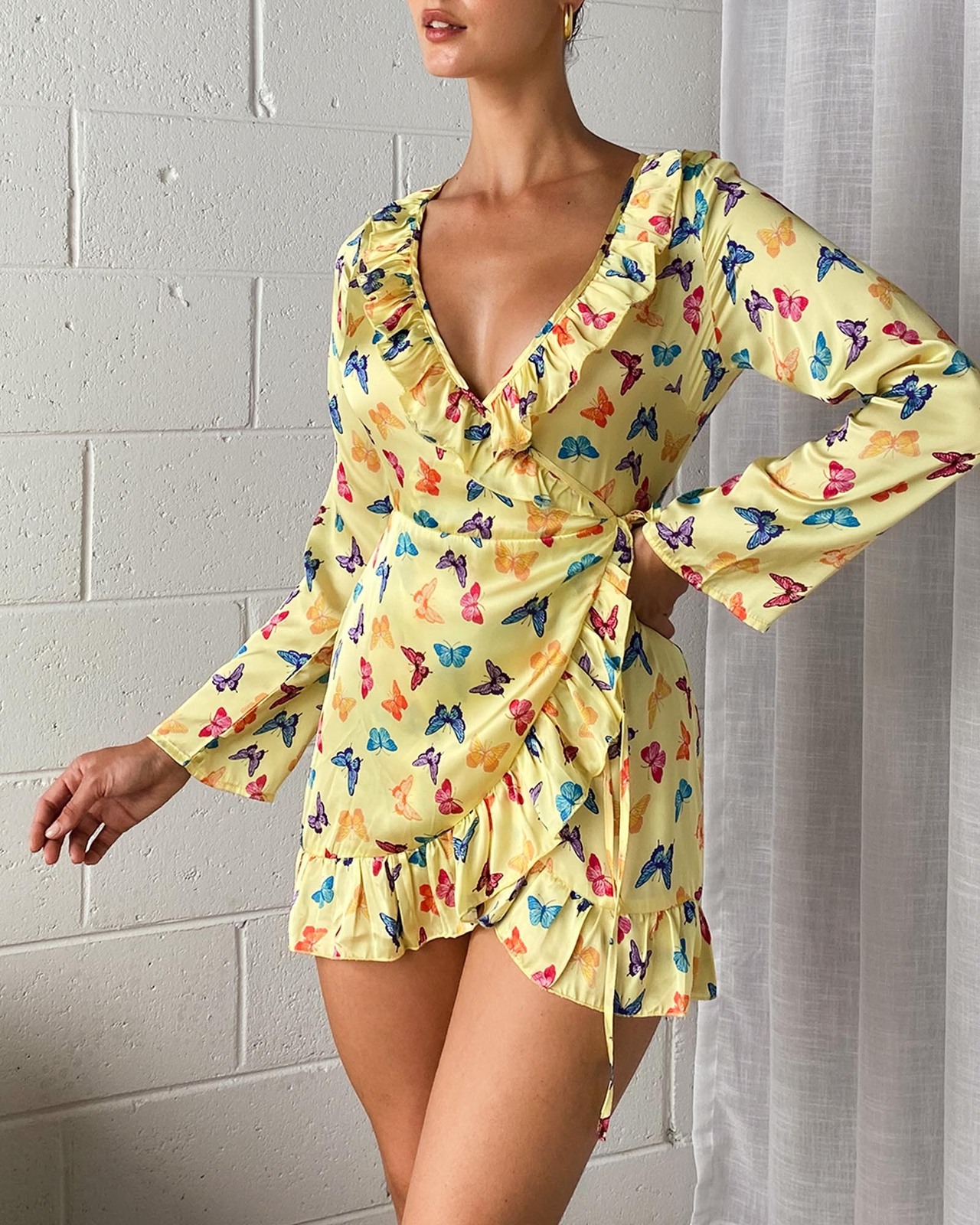 Metamorphosis Wrap Mini Dress