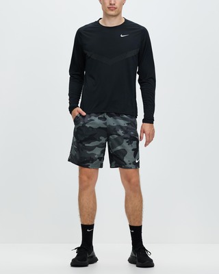 nike training shorts with camo swoosh in black