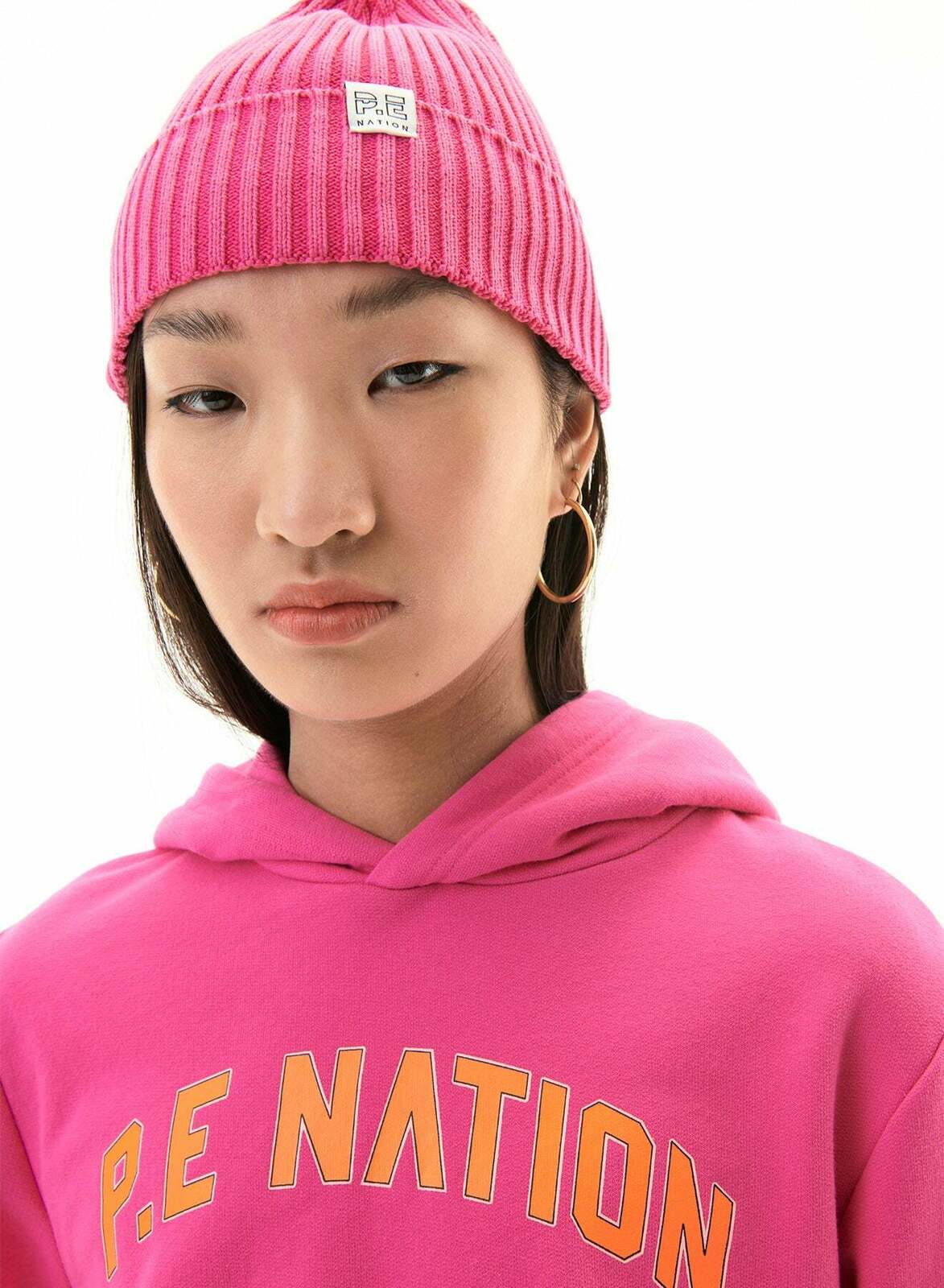 DEFENDING ZONE HOODIE IN PINK GLO