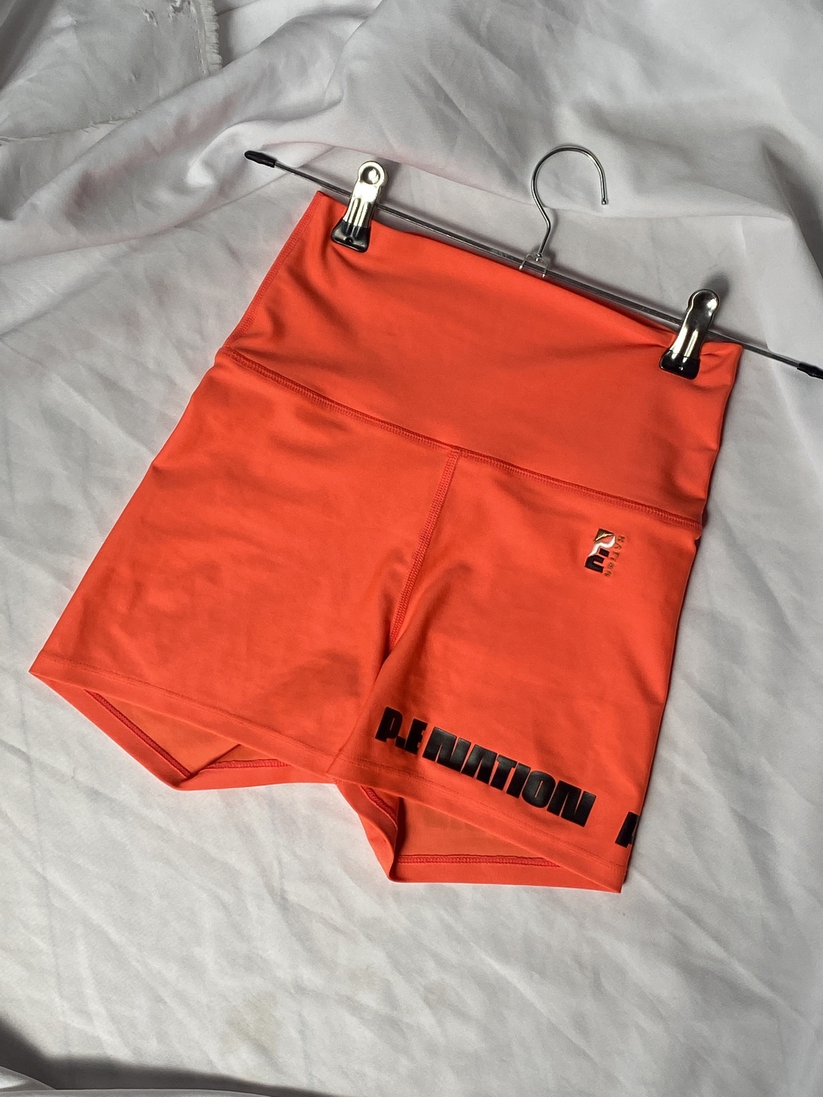PE NATION Air Ball Shorts in coral XS