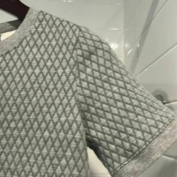 Grey Diamond Quilted Crew Neck Ruffle Hem Drop Waist Dress