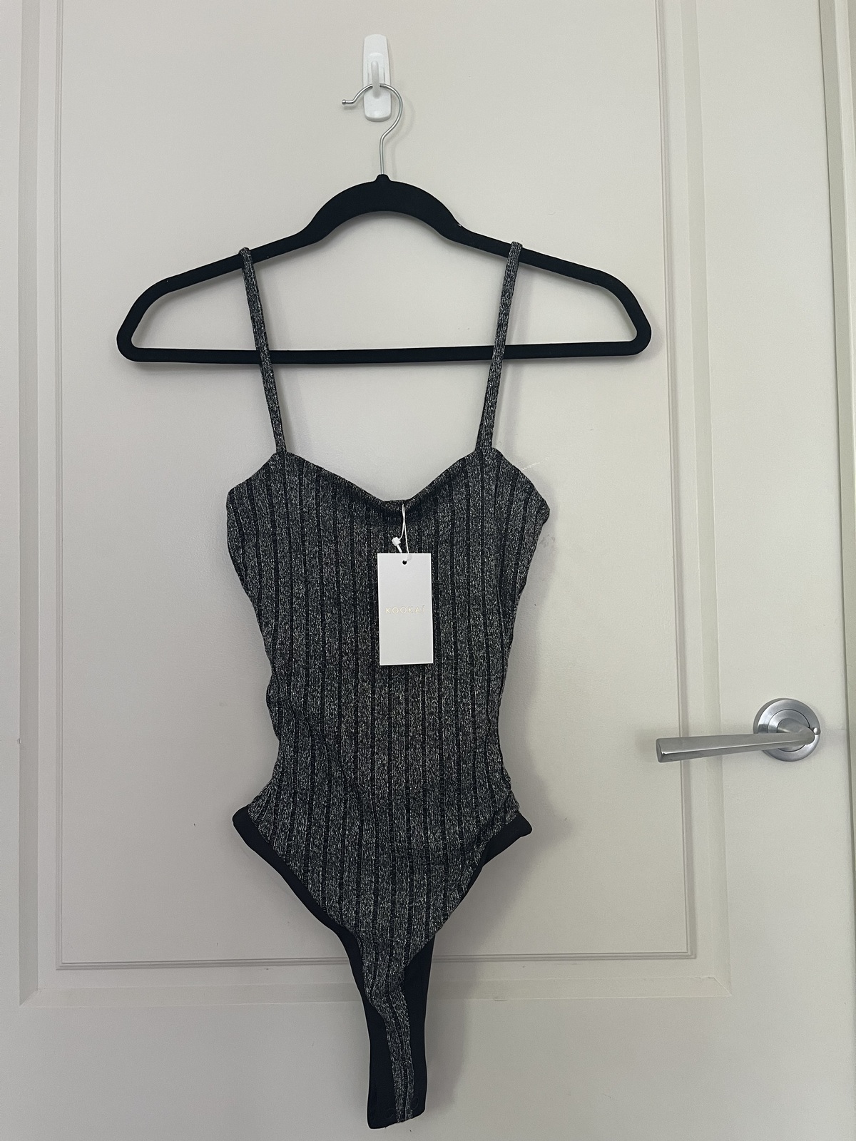 BNWT glitter bodysuit size 1 RRP$80